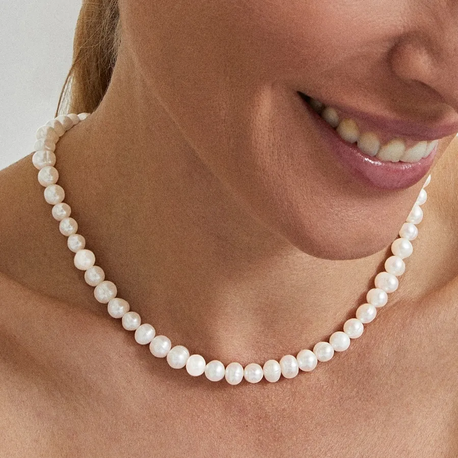 Collar de Plata de Ley 925 con Perla Blanca acabado en oro amarillo 18K - Kipepeo