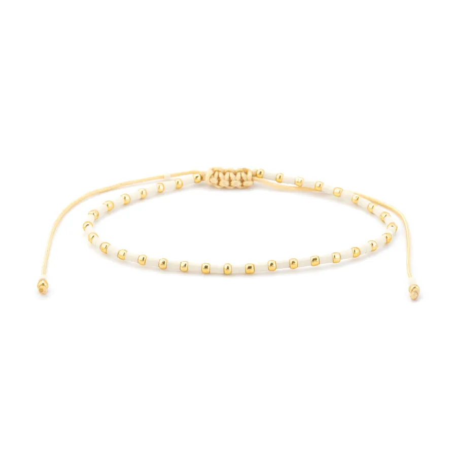 Pulsera acabado oro amarillo de 18k y Resina Crema - Uky