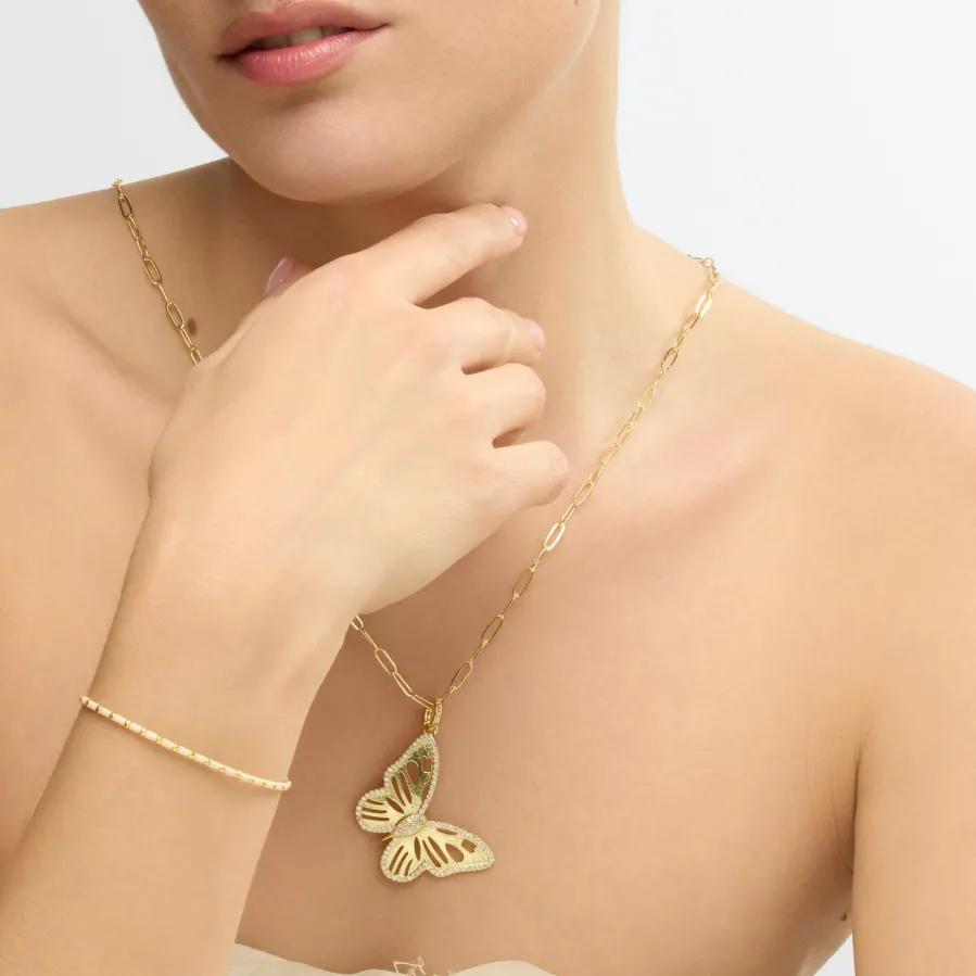 Pulsera acabado oro amarillo de 18k y Resina Crema - Uky