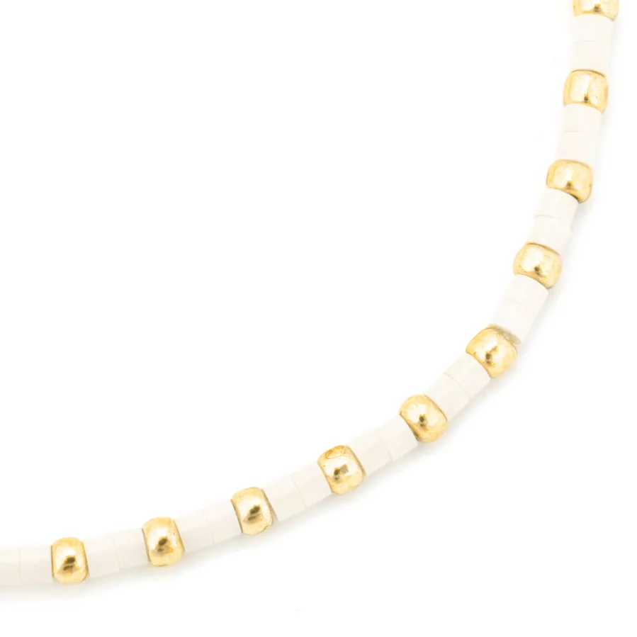 Pulsera acabado oro amarillo de 18k y Resina Crema - Uky
