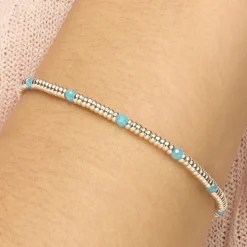 Pulsera de Plata de Ley 925 y Circonita Aguamarina acabado rodio - Deli